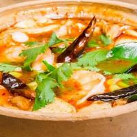Classic Tom Yum · Classic lime-lemongrass shrimp soup, mushroom, fresh chili