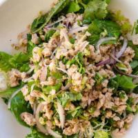 Larb Gai · Spicy ground chicken salad, roasted rice powder, chili, lime, fresh herbs
