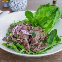Neur Namtok · Grilled steak salad, roasted rice powder, chili, lime, fresh herbs