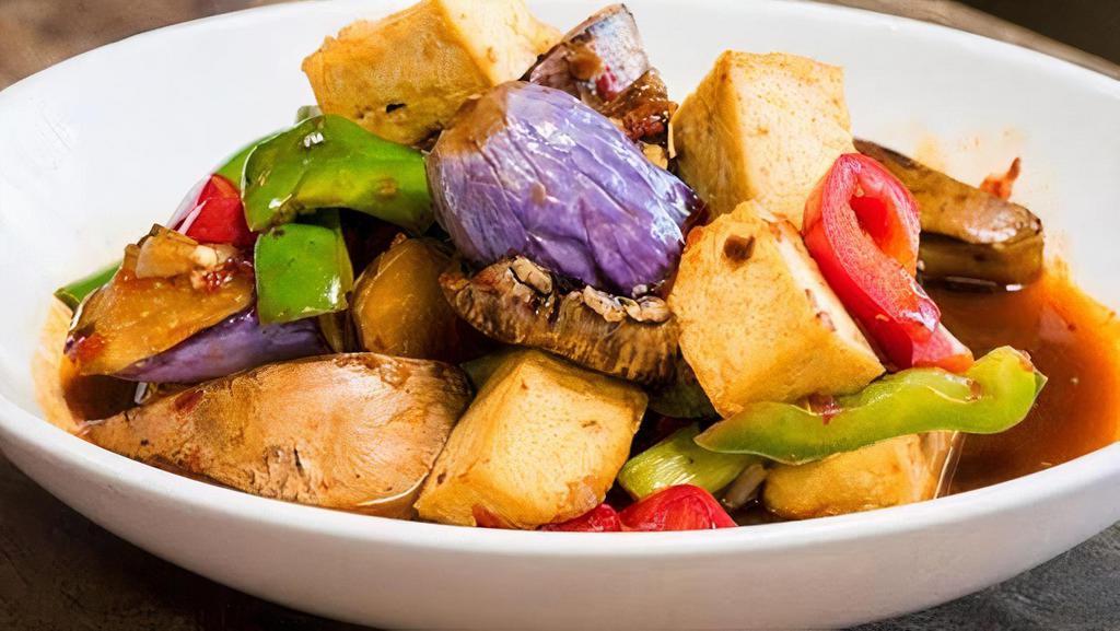 Basil's Eggplant · Japanese eggplant & shitake mushroom stir-fried with tofu, scallions, bell peppers, roasted chili jam