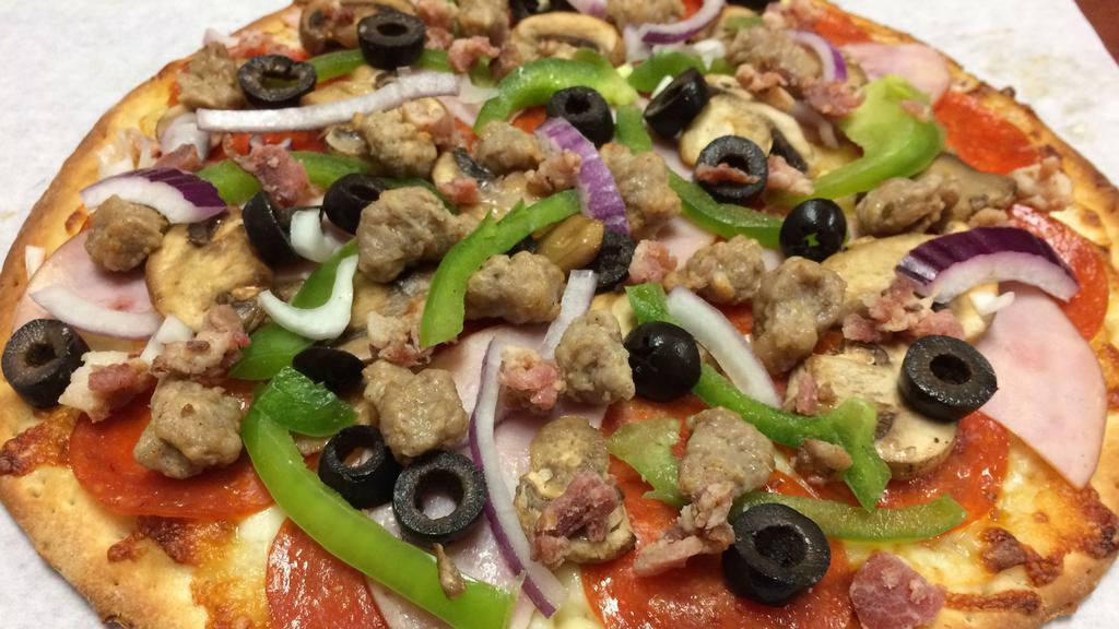 Combination · Red sauce, mozzarella, pepperoni, ham, sausage, mushrooms, black olives, bell peppers, red onions, bacon.