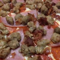 Meat Lover · Red sauce, mozzarella, pepperoni, ham, sausage, ground beef, bacon.