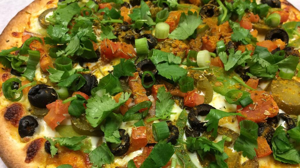 Curry Veggie · Curry sauce, mozzarella, mushrooms, green bell peppers, black olives, red onions, jalapenos, diced tomatoes, fresh cilantro and green onion.