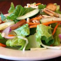Garden Salad · Romaine, tomatoes, cucumbers, red onions, carrots, mozzarella and croutons with ranch dressi...