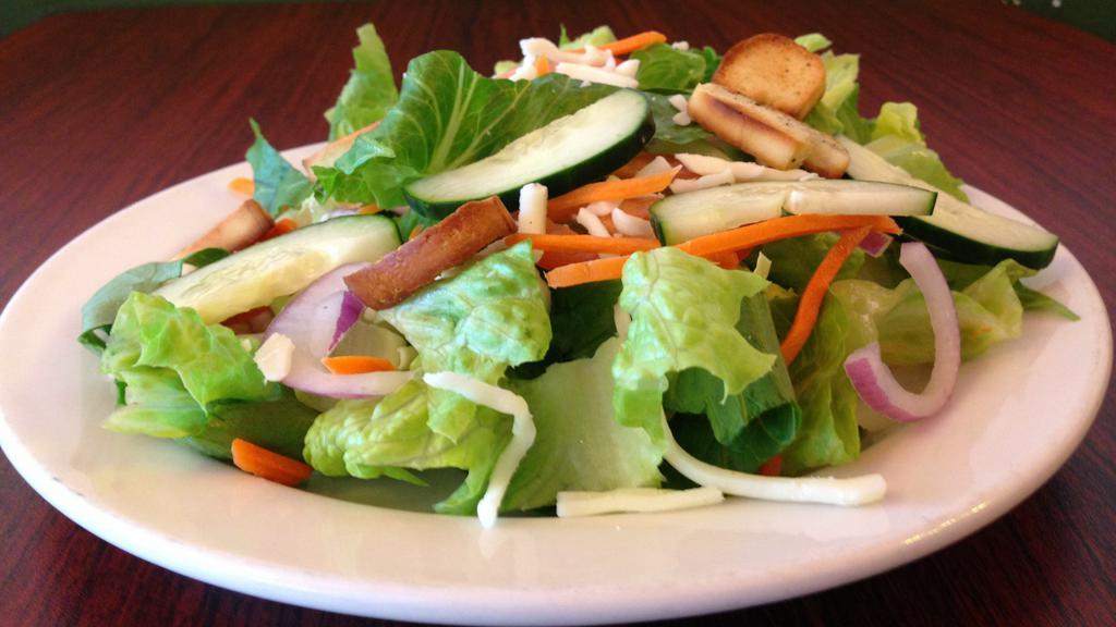 Garden Salad · Romaine, tomatoes, cucumbers, red onions, carrots, mozzarella and croutons with ranch dressing.