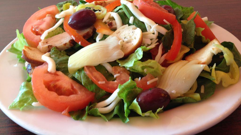Italian Salad with Chicken · Romaine, red bell peppers, pepperoncinis, kalamata olives, artichoke hearts, tomatoes, mozzarella, croutons, chicken and Italian dressing.