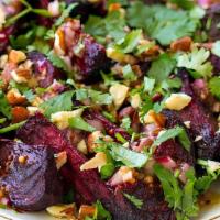 Roasted Purple Beet Salad · goat cheese, grapefruit segments, olive oil.