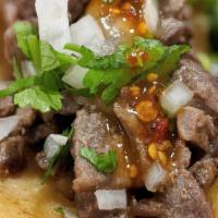 Tacos De Asada · Grilled steak taco