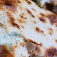 Quesadilla Super · Flour tortilla, meat of your choice, cheese, cilantro, onions and sour cream.