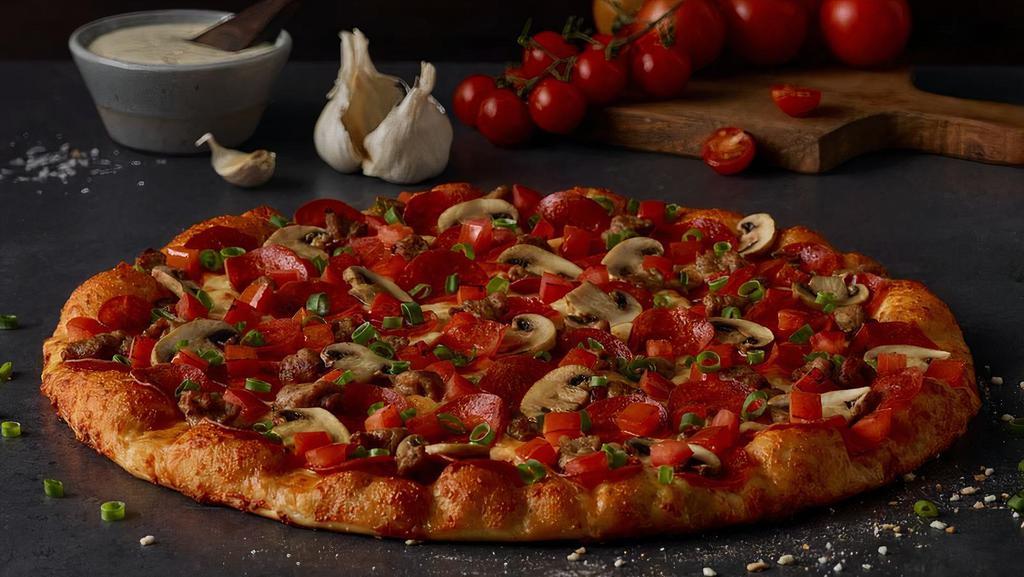 Italian Garlic Supreme Pizza · Pepperoni, Italian sausage, tomatoes, mushrooms, green onions, garlic on creamy garlic sauce.