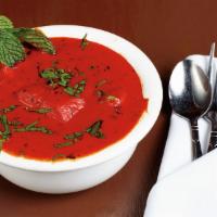 Chicken Tikka Masala · Boneless chicken tikka cooked with onions, bell peppers in a creamy tomato sauce.