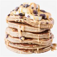 Peanut Butter Banana Chocolate Chip Pancakes · Two large chocolate chips, peanut butter, and banana pancakes served with syrup.