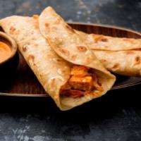 Paneer Tikka Wrap · Grilled pieces of melt in your mouth paneer served wrapped in a freshly baked pillowy soft n...