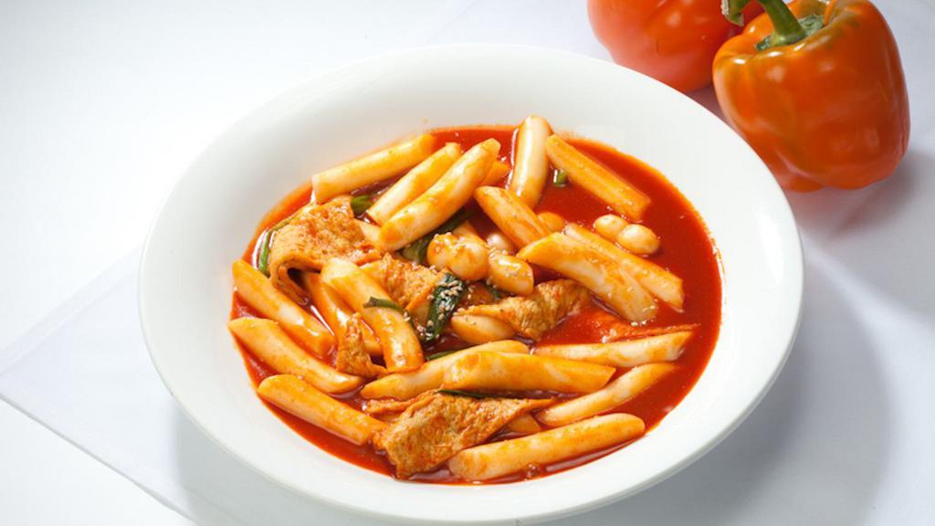 Tteokbokki · Boiled rice cakes, fish cakes with spicy paste.