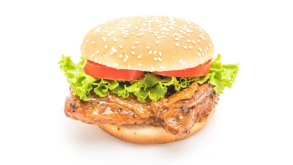 Chicken Burger · Grilled chicken with your choice of toppings between two fluffy breads.
