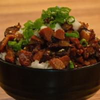 Chashu Don · Japanese rice, seared pork belly, onion, green onion, furikake, roasted sesame.