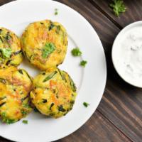 Vegetable Cutlets (6) · Six pieces of a delectable combination of mashed potatoes and vegetables. crispy on the outs...