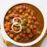 Channa Masala · A traditional north Indian dish comprising of chickpeas in a flavorful curry.