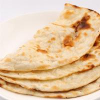 Tandoori Roti · Roti made of whole wheat flour and traditionally cooked in a clay oven or tandoor.