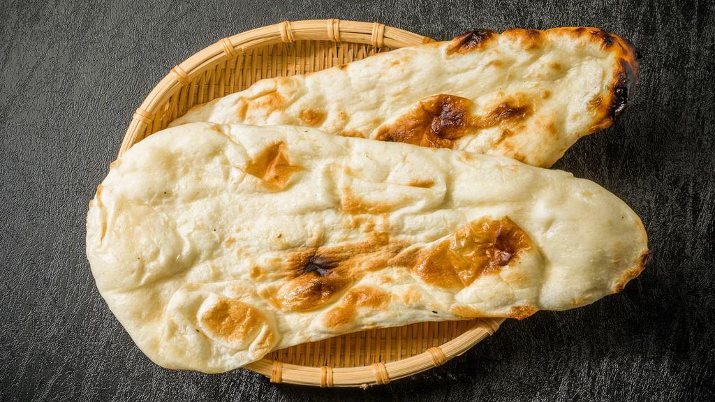 Plain Naan · Served in 2 pieces.