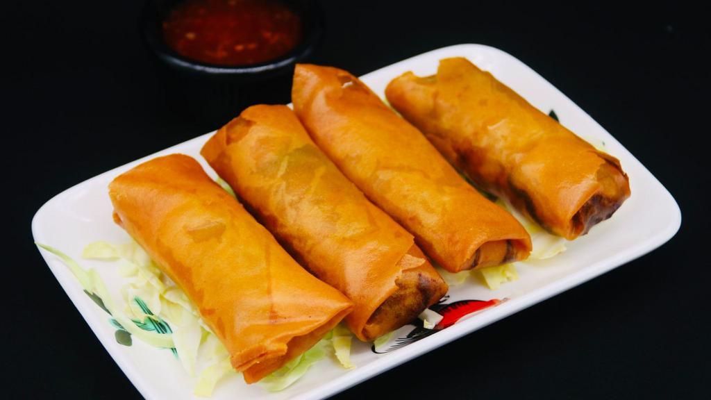 Egg Rolls (4 Pieces) · Vegetarian egg rolls served with sweet and sour sauce on the side.