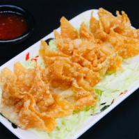Fried Won Tons (8 Pieces) · Deep fried won tons served with sweet and sour sauce on the side.