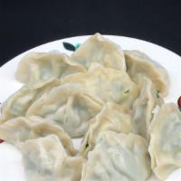 Pork & Sweet Corn Dumplings (10 Pieces) · Boiled. Dumplings filled with mixture of seasoned ginger and garlic infused ground pork and ...