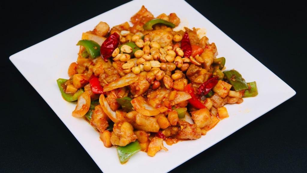 Kung Pao Chicken · Diced chicken stir fried with zucchini, bell peppers, onions, celery, water chestnuts in spicy kung pao sauce.