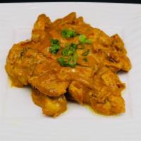 Curry Chicken · Stir fried chicken in yellow curry sauce with bell peppers, onions and carrots.