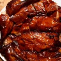 Roast Duck - Whole Bird 全隻燒鴨 · Whole bird trimmed and chopped.  Come with duck au jus and plum sauce.