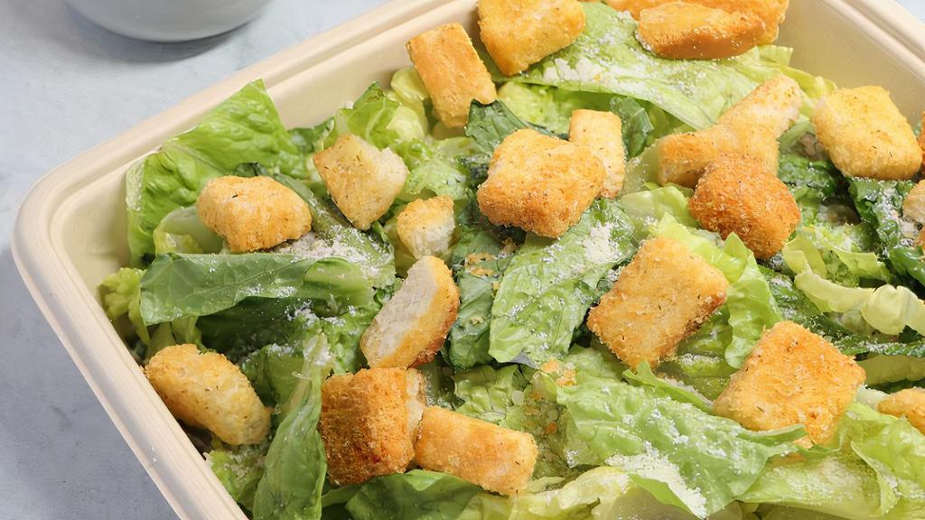 Side Ceasar Salad · Fresh Romain Lettuce, Classic Ceasar Dressing