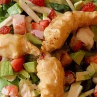 Lychee Salad · Mixed greens, lychee, avocado, green apple, strawberry, homemade lychee dressing topped with...