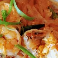 Pad Thai  · Stir-fried thin rice noodles with egg, tofu, green onions, bean sprouts, with shrimps, chick...