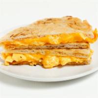Cheesy 'Zone · Get cheesy with fluffy pizza dough folded over whipped eggs, American cheese, and cheddar ch...