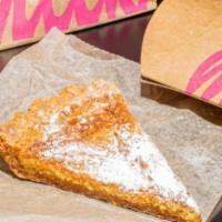 Milk Bar Pie Slice · A slice of our namesake pie. Gooey, buttery goodness in a hearty toasted oat cookie crust — ...