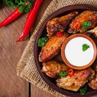 Marhaba Spicy Wings · 5 delicious fried spicy chicken wings.