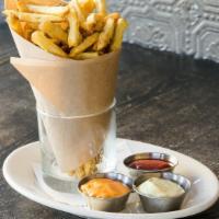 House Fries · Share-sized hand-cut kennebec potatoes, made to order with house tomato jam, rosemary, and c...