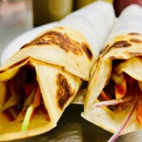Calcutta Chicken Egg Roll · Thin paratha with eggs and fresh cucumber, onion ,carrots, chicken and sauce ( ketchup, must...
