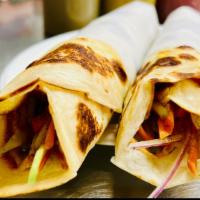 Calcutta Egg Roll · Thin paratha with egg and fresh vegetables, mustard sauce tomato, ketchup.