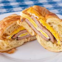 9. 2 Fried Eggs & Cheese on croissant w/ ham · 