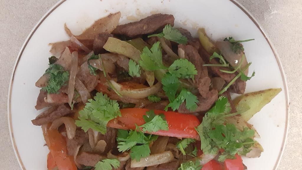 Boneless Beef stew  · This dish is a plate and comes with rice and side salad. Customer could choice spicy , none spicy or mild. Traditionally , its spicy dish and well done.