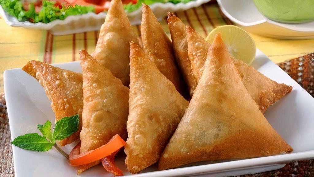 Fish Samosa · Fish Samosa : we use Tilapia fillet as well as Salmon, Traditional very spicy . you can can ask for medium spicy.