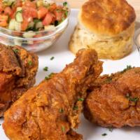 Fried Chicken Entree · Three pieces of juicy fried chicken dusted with our signature herb and spice blend. One half...