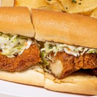 Fried Chicken Sandwich · Crispy fried chicken dusted with our signature herb and spice blend, topped with spicy slaw ...