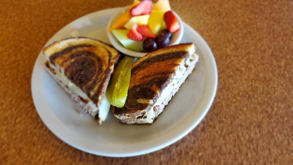 Patty Melt · Grilled rye bread, swiss cheese and grilled onions.