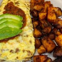 Chorizo Omelette* · Fluffy omelette served with crumbled Mexican chorizo, avocado, onions and cheddar cheese and...