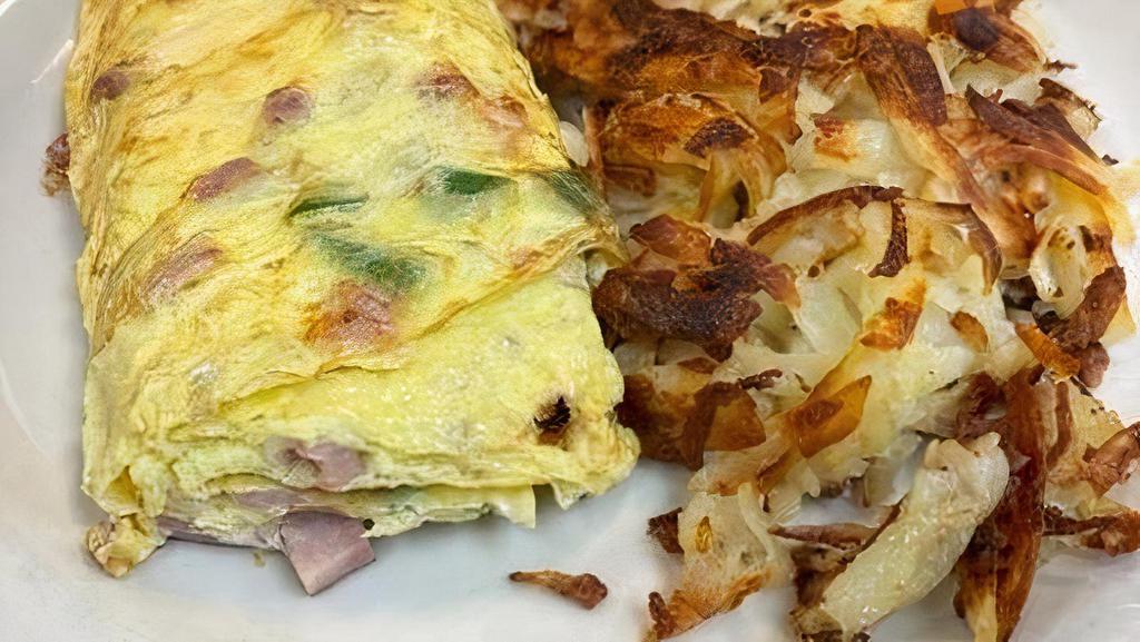 Denver Omelette* · Filled with bell peppers, onions ,ham and american cheese