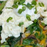Veggie Skillet* · Mushrooms, spinach, asparagus, tomato, avocado, onions and cheddar cheese. Topped with scram...