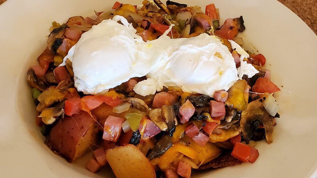 Bill's Original Skillet* · Country fried potatoes, onions, ham, cheddar cheese, mushrooms, tomatoes and green peppers, topped with two eggs any style.
