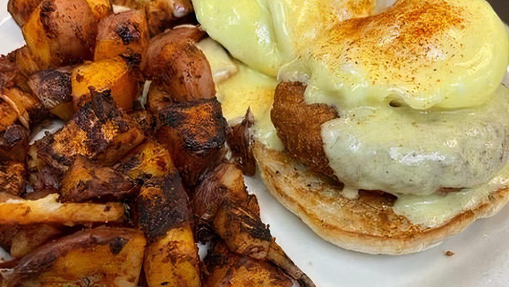 Crab Cakes Benedict* · Two crab cakes, two poached eggs and a rich hollaindaise sauce on an English muffin.